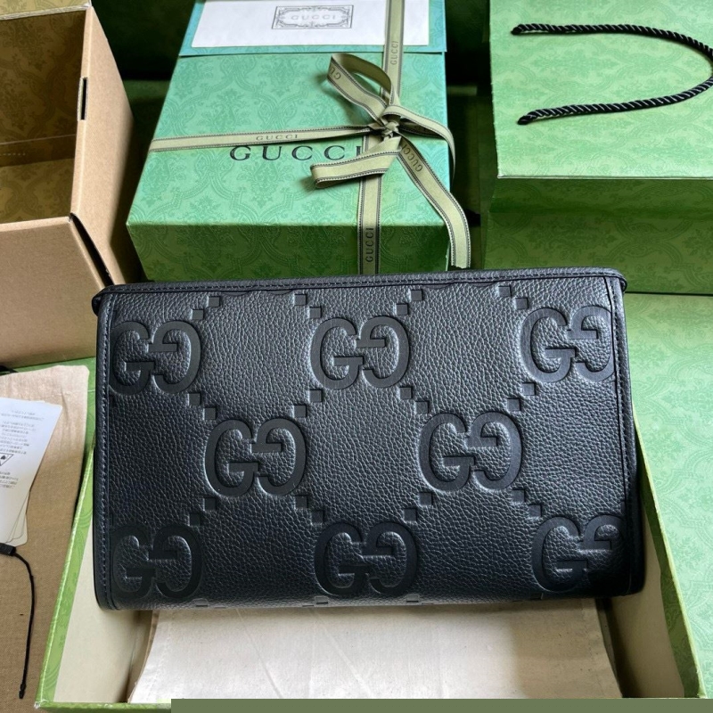 G*u*i clutch bags